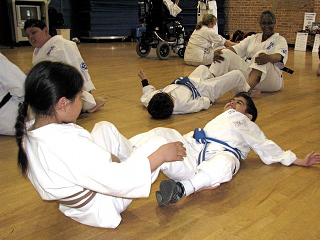 ASK student abad, and tw student tj doing sit-ups